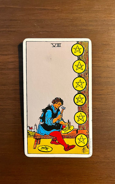 Tarot Card of the Day: April 18, 2022 -- Eight of Pentacles