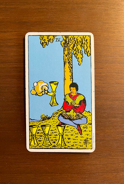 Tarot Card of the Day: June 23, 2021 — Four of Cups