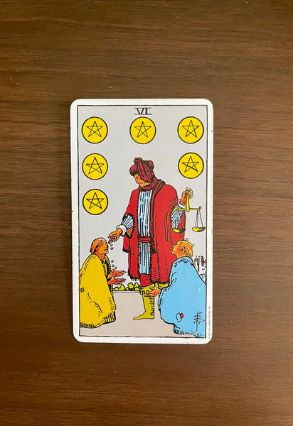 Tarot Card of the Day: July 6, 2021 — Six of Pentacles