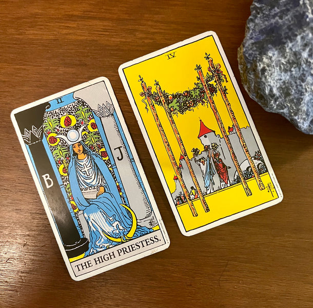 Tarot Cards of the Day: July 29, 2022 -- The High Priestess and Four of Wands